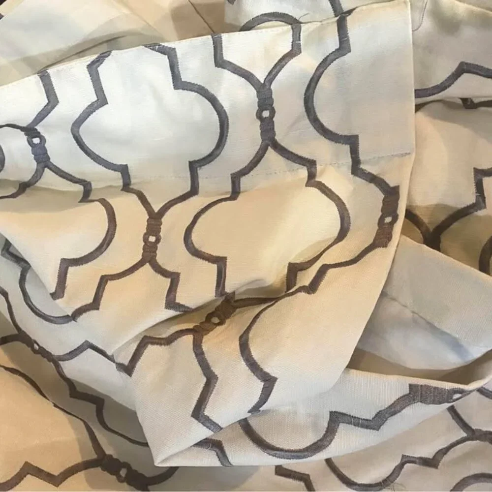 2 New West Elm 48W x 84L Beige with Grey Embroidery Curtains. DISCONTINUED